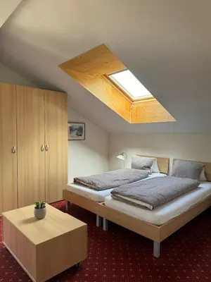 Ein Bett oder Betten in einem Zimmer der Unterkunft Hotel Residence