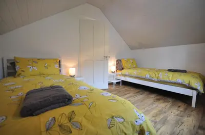 Ein Bett oder Betten in einem Zimmer der Unterkunft Interlaken Central 4