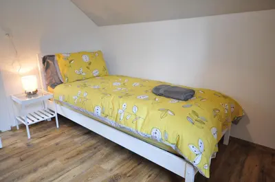 Ein Bett oder Betten in einem Zimmer der Unterkunft Interlaken Central 4