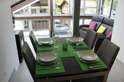 Ein Sitzbereich in der Unterkunft Haus Dorf 7