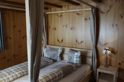 Ein Bett oder Betten in einem Zimmer der Unterkunft Chalet am Irfig