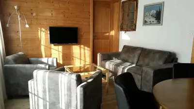Ein Sitzbereich in der Unterkunft Chalet am Irfig