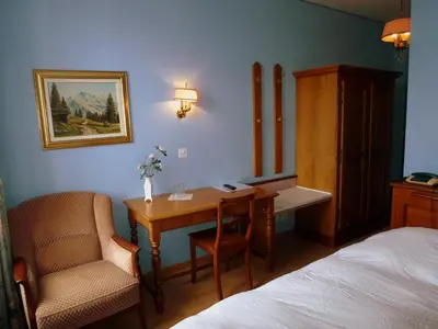 Ein Bett oder Betten in einem Zimmer der Unterkunft Hotel Central Continental