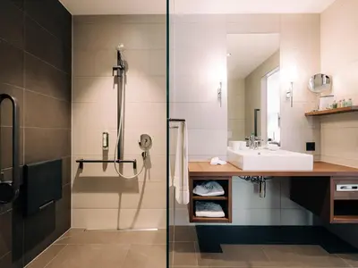 Ein Badezimmer in der Unterkunft Deltapark Vitalresort****
