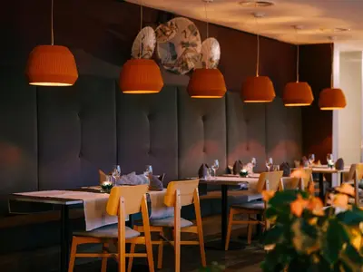 Ein Restaurant oder anderes Speiselokal in der Unterkunft Deltapark Vitalresort****