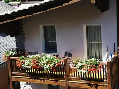 Ein Balkon oder eine Terrasse in der Unterkunft Alpine Lodge