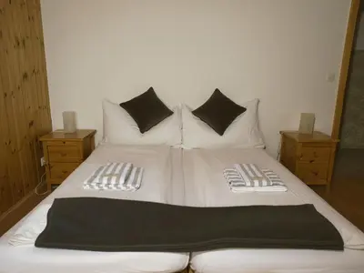 Ein Bett oder Betten in einem Zimmer der Unterkunft Hotel Aletschhorn