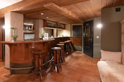 Ein Sitzbereich in der Unterkunft Hotel Alpenhof