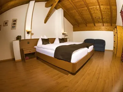 Ein Bett oder Betten in einem Zimmer der Unterkunft Hotel Massa