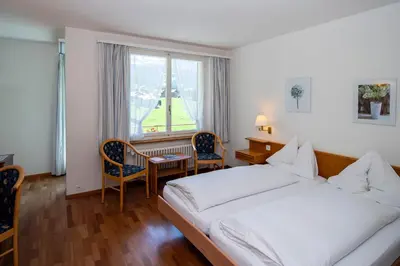Ein Bett oder Betten in einem Zimmer der Unterkunft Hotel Berghaus