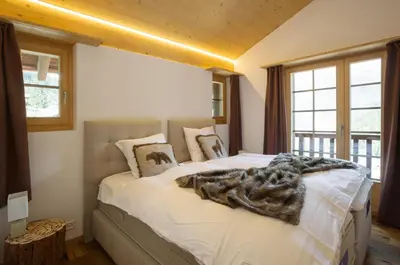Ein Bett oder Betten in einem Zimmer der Unterkunft Tenaya