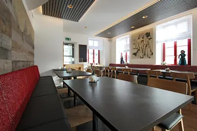 Ein Restaurant oder anderes Speiselokal in der Unterkunft Hotel Blattnerhof