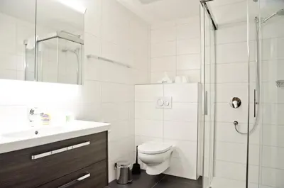 Ein Badezimmer in der Unterkunft Apartment Flüehblüemli - GRIWA RENT AG
