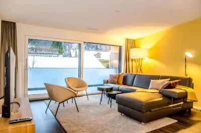 Ein Sitzbereich in der Unterkunft Apartment Gänseblüemli - GRIWA RENT AG