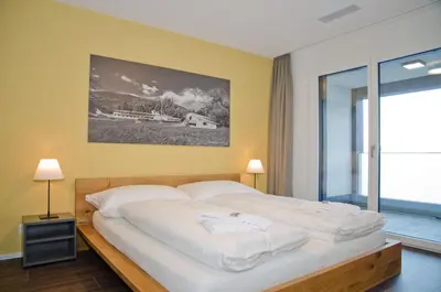 Ein Bett oder Betten in einem Zimmer der Unterkunft Apartment Silberdistel - GRIWA RENT AG