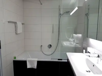 Ein Badezimmer in der Unterkunft Apartment Silberdistel - GRIWA RENT AG