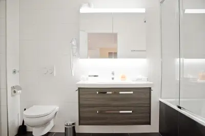 Ein Badezimmer in der Unterkunft Apartment Ankebälleli - GRIWA RENT AG