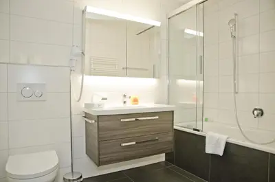 Ein Badezimmer in der Unterkunft Apartment Alperose - GRIWA RENT AG