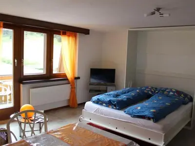 Ein Bett oder Betten in einem Zimmer der Unterkunft Apartment Silberdistel by Interhome