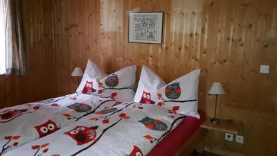 Ein Bett oder Betten in einem Zimmer der Unterkunft Alpensonne