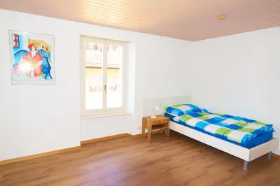 Ein Bett oder Betten in einem Zimmer der Unterkunft City Center Holiday Apartment