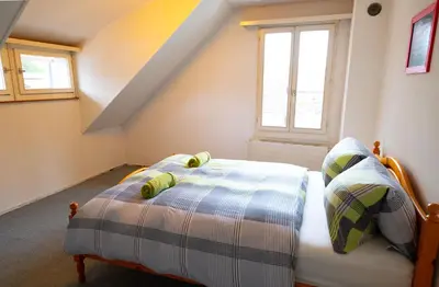 Ein Bett oder Betten in einem Zimmer der Unterkunft City Center Holiday Apartment