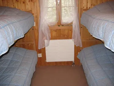 Ein Bett oder Betten in einem Zimmer der Unterkunft Apartment Arnika # 2 by Interhome