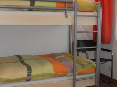 Ein Bett oder Betten in einem Zimmer der Unterkunft Apartment Rawilstrasse 33 by Interhome