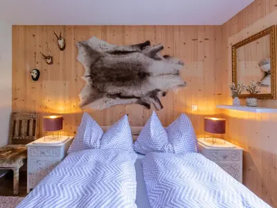 Ein Bett oder Betten in einem Zimmer der Unterkunft Apartment Chalet Lerchweid Lenk by Interhome