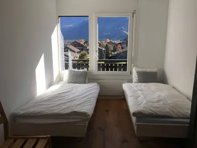 Ein Bett oder Betten in einem Zimmer der Unterkunft Apartment Turmalin 2- Stock by Interhome