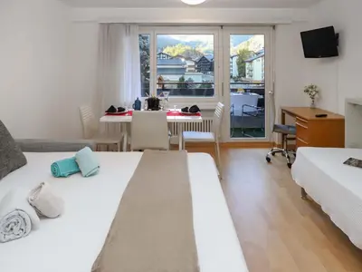 Ein Bett oder Betten in einem Zimmer der Unterkunft Apartment Residence A-3 by Interhome