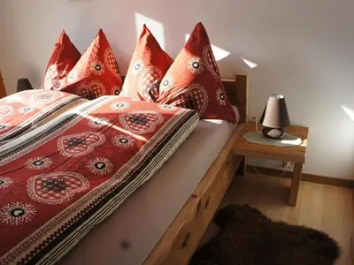 Ein Bett oder Betten in einem Zimmer der Unterkunft Apartment Sweda EG Süd by Interhome