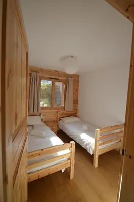 Ein Bett oder Betten in einem Zimmer der Unterkunft Le Nid de Martinet
