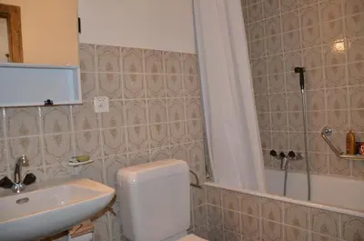 Ein Badezimmer in der Unterkunft Immeuble La Maya