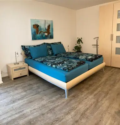 Ein Bett oder Betten in einem Zimmer der Unterkunft Bodmen B