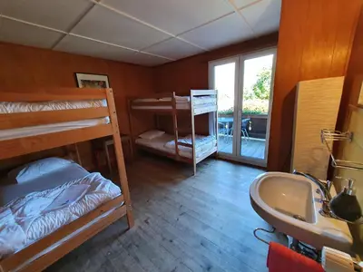 Ein Bett oder Betten in einem Zimmer der Unterkunft Lake Lodge Hostel