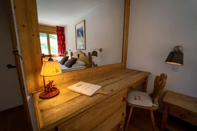 Ein Sitzbereich in der Unterkunft Hôtel Magrappé