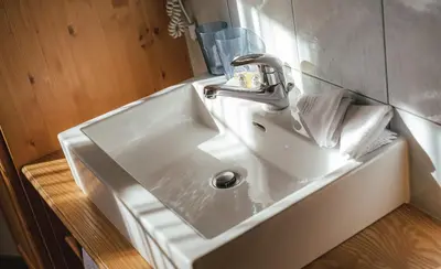 Ein Badezimmer in der Unterkunft Guesthouse by the rex