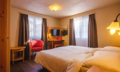 Ein Bett oder Betten in einem Zimmer der Unterkunft Guesthouse by the rex