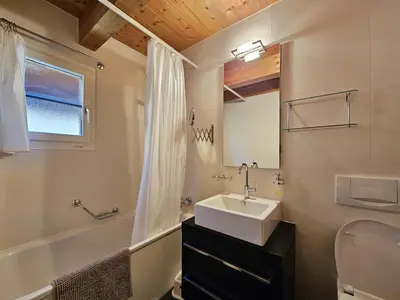 Ein Badezimmer in der Unterkunft Chalet Flair