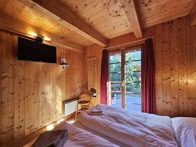 Ein Bett oder Betten in einem Zimmer der Unterkunft Chalet Flair