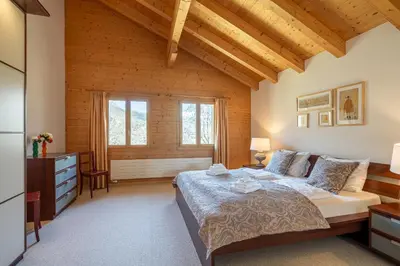 Ein Bett oder Betten in einem Zimmer der Unterkunft Chalet Studen