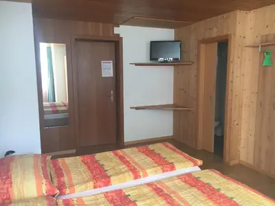 Ein Bett oder Betten in einem Zimmer der Unterkunft Hotel Hof und Post