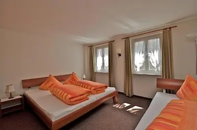 Ein Bett oder Betten in einem Zimmer der Unterkunft Gasthaus Skiklub
