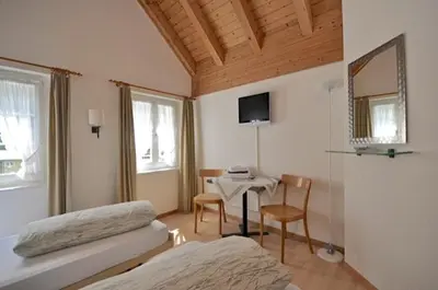 Ein Bett oder Betten in einem Zimmer der Unterkunft Gasthaus Skiklub