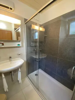 Ein Badezimmer in der Unterkunft Hotel Antico