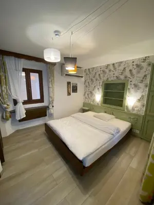 Ein Bett oder Betten in einem Zimmer der Unterkunft Hotel Antico