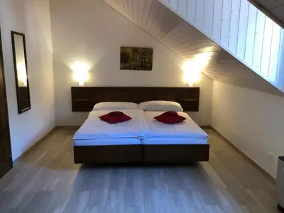 Ein Bett oder Betten in einem Zimmer der Unterkunft Hotel Antico