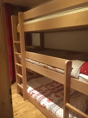 Ein Bett oder Betten in einem Zimmer der Unterkunft Crans Montana Cervin 35