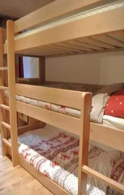 Ein Bett oder Betten in einem Zimmer der Unterkunft Crans Montana Cervin 35